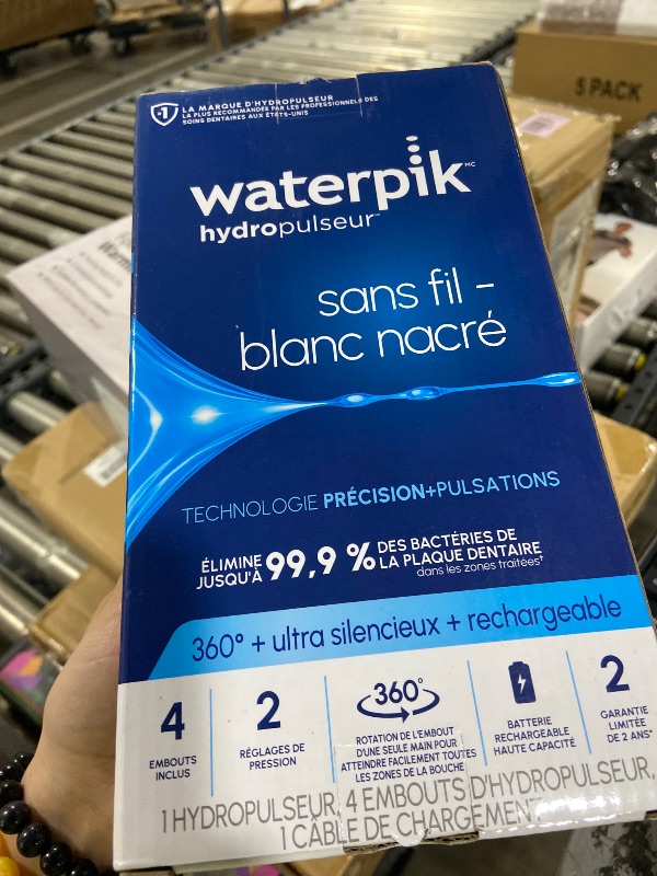 Photo 1 of **USED** Waterpik Cordless Pearl Rechargeable Portable Water Flosser for Teeth, Gums, Braces Care and Travel, Extra Quiet, 4 Flossing Tips - ADA Accepted, WF-13 White, Amazon Exclusive
