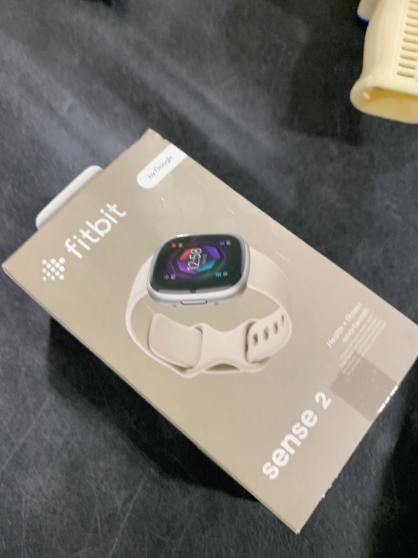 Photo 1 of Fitbit Sense 2 Advanced Health and Fitness Smartwatch with Tools to Manage Stress and Sleep, ECG App, SpO2, 24/7 Heart Rate and GPS, Lunar White/Platinum, One Size (S & L Bands Included)
