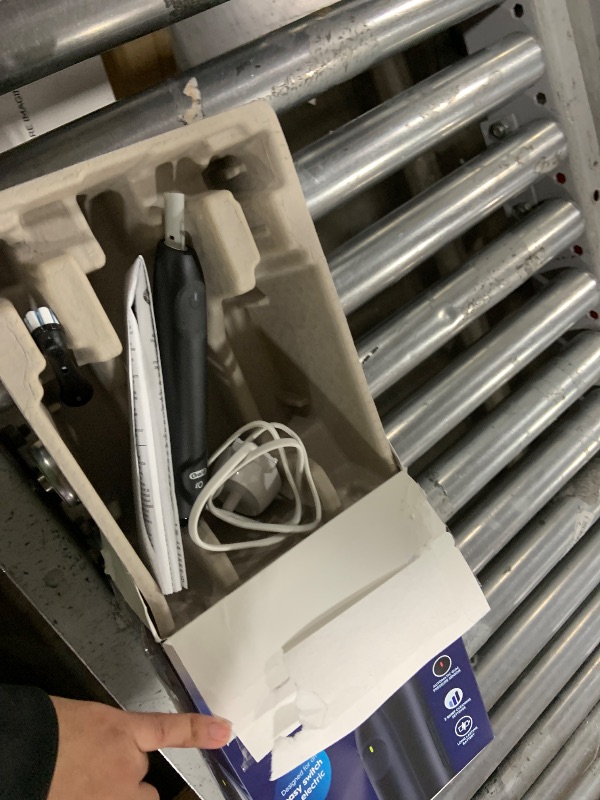 Photo 1 of Oral-B iO Simple Clean Rechargeable Electric Powered Toothbrush, Night Black with 1 Gentle Care Brush Head and 1 Black Travel Case - Automatic Pressure Sensor to Protect Gums - 3 Modes - 2 Min Timer