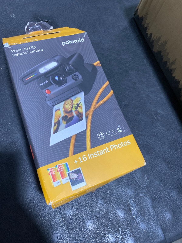 Photo 1 of Polaroid Flip Instant Camera + Color Film Bundle (16 Photos Included) - Black (6565) - Hyperfocal 4-Lens System, Sonar autofocus, and Sence Analysis with Bluetooth paired Companion app