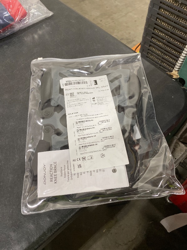 Photo 1 of DonJoy Reaction Web Knee Support Brace with Compression Knee Sleeve | Superior Comfort Knee Support SleeveKnee Sleeve for Men and Women: Grey, Medium/Large