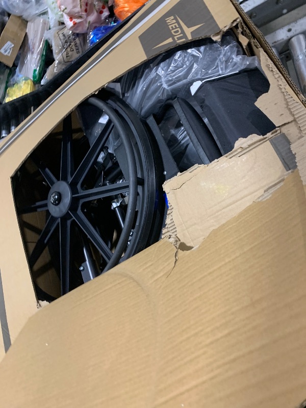 Photo 1 of Medline Lightweight Wheelchair for Adults With Swing-Back, Desk-Length Arms, Elevating Leg Rests; 20" x 16"D Seat