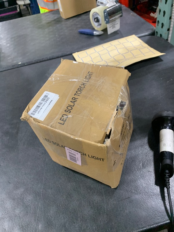 Photo 1 of iBaycon Solar Halloween Lights, 42Ft 15 LED Bulbs Flickering Flame String Light, Outdoor Waterproof Solar Flame Lights for Garden Yard Patio Halloween Decorations (Warm White + Purple)