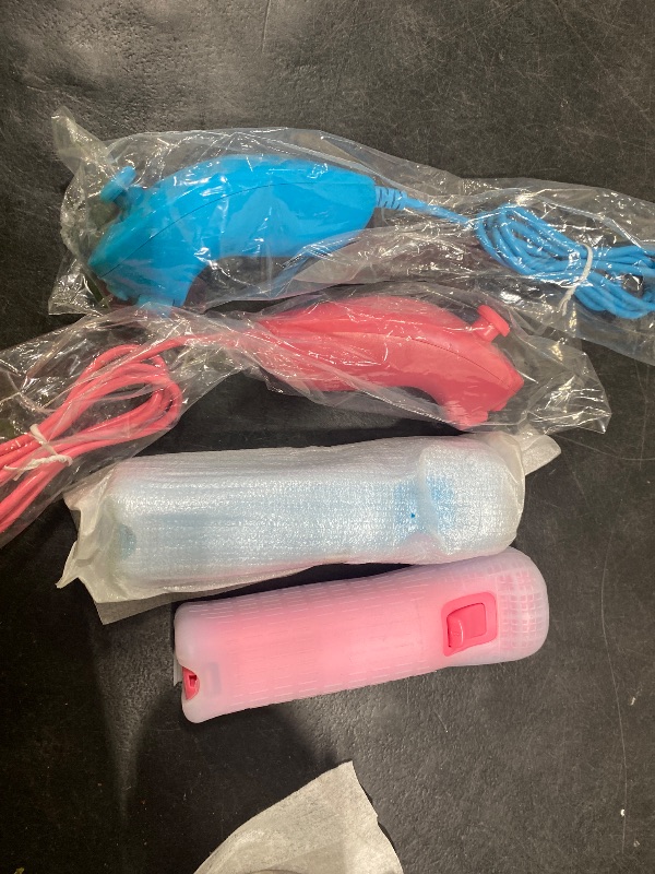 Photo 1 of CONTROLLERS BLUE/PINK - SOLD AS IS