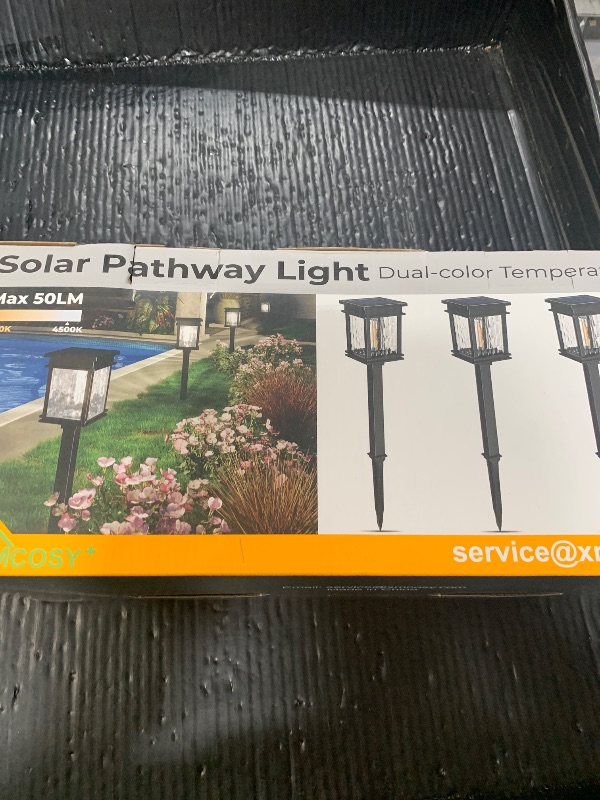 Photo 1 of XMCOSY+ Solar Pathway Lights, 4 Pack 2-in-1 Landscape Lighting for Garden
