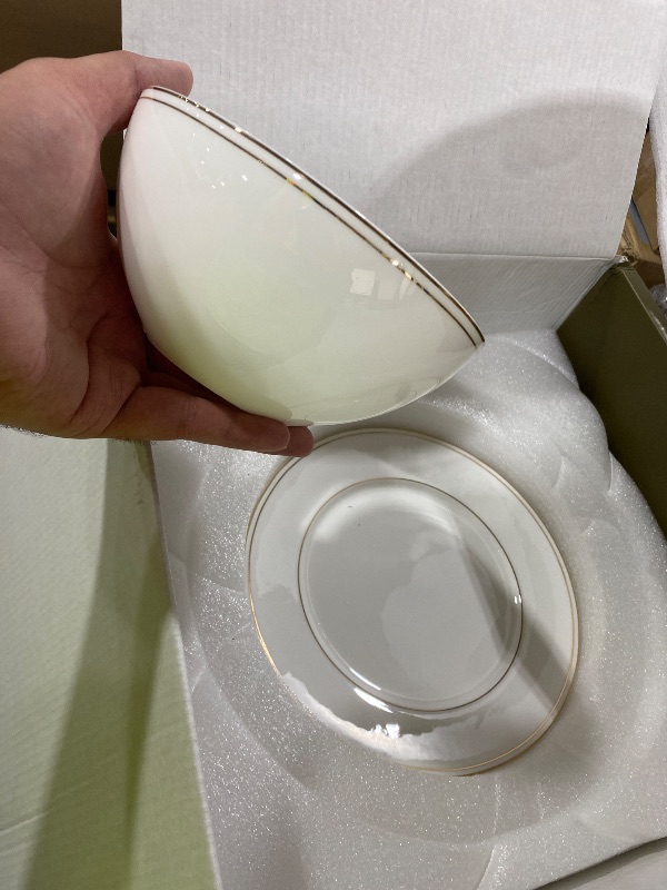 Photo 1 of KINGSTONE Bone China Dinnerware Set, 12-Piece Dishes Set for 4, Elegant Gold Trim Ceramic Plates & Bowls, Lightweight Translucent Dishware for Home Dining, Festival Banquet, Party & Gift( 2 small plates are missing) 
