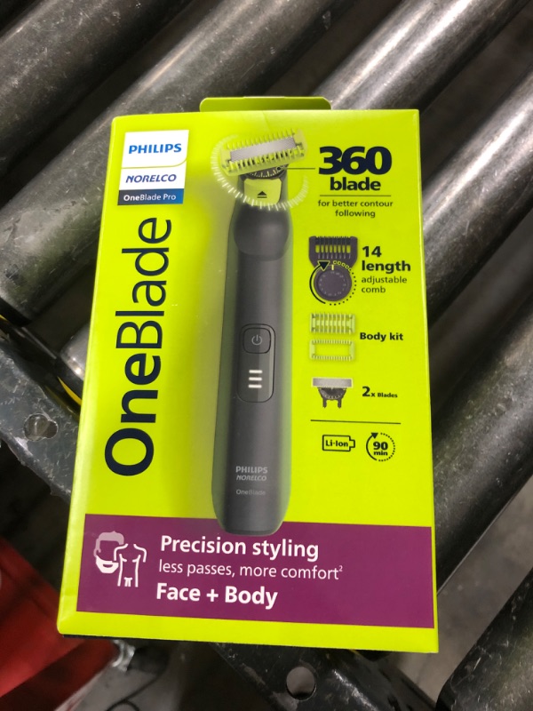 Photo 1 of Philips Norelco OneBlade Pro 360 Face + Body Electric Shaver, Beard Trimmer and Groomer, with 360 Blade Technology, 14-Length Precision Comb, Body Kit, Soft Pouch, Model QP6542/70