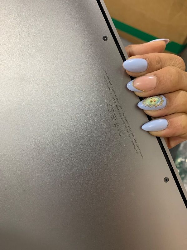 Photo 1 of Apple 2025 MacBook Air 13-inch Laptop with M4 chip: Built for Apple Intelligence, 13.6-inch Liquid Retina Display, 16GB Unified Memory, 512GB SSD Storage, 12MP Center Stage Camera, Touch ID; Sky Blue