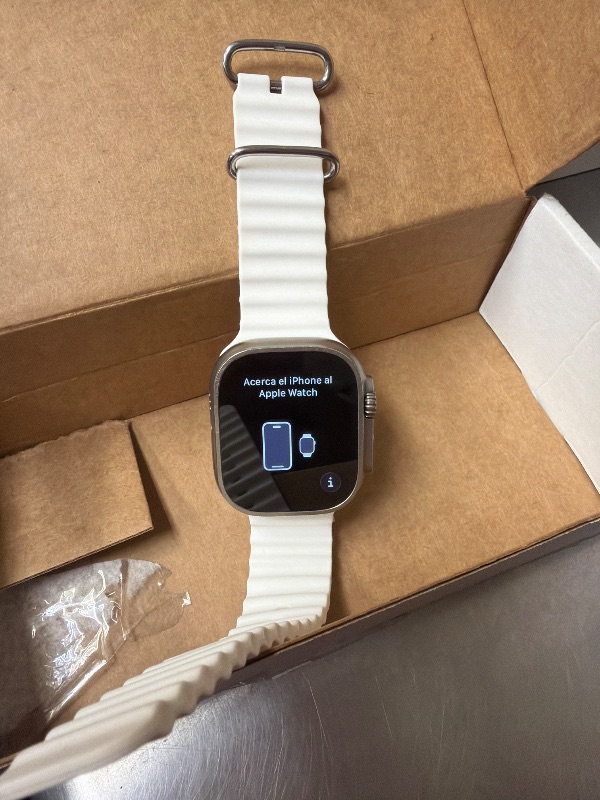 Photo 1 of *LOCKED*Apple Watch Ultra 2 [GPS + Cellular 49mm] Smartwatch with Rugged Titanium Case & White Ocean Band. Fitness Tracker, Precision GPS, Action Button, Extra-Long Battery Life, Bright Retina Display