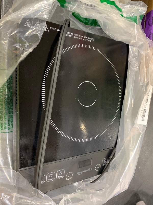 Photo 1 of Amazon Basics 1800W Portable Induction Cooktop