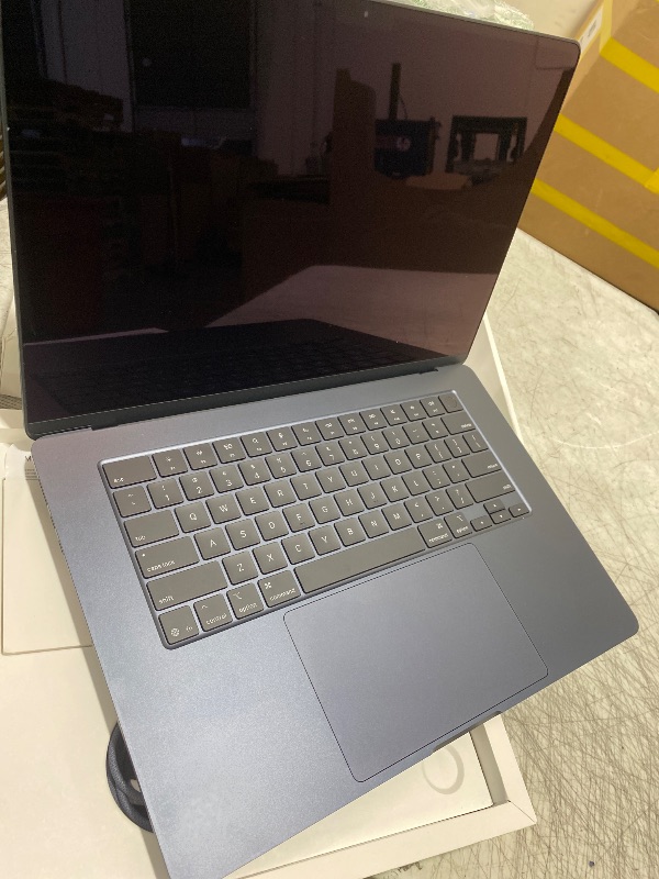 Photo 1 of Apple 2025 MacBook Air 15-inch Laptop with M4 chip: Built for Apple Intelligence, 15.3-inch Liquid Retina Display, 16GB Unified Memory, 256GB SSD Storage, 12MP Center Stage Camera, Touch ID; Midnight