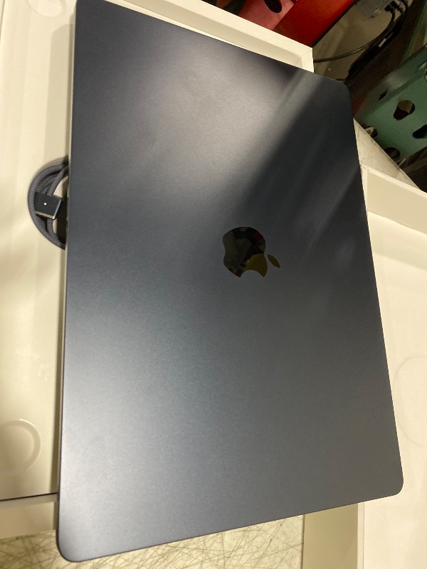 Photo 1 of Apple 2025 MacBook Air 15-inch Laptop with M4 chip: Built for Apple Intelligence, 15.3-inch Liquid Retina Display, 16GB Unified Memory, 256GB SSD Storage, 12MP Center Stage Camera, Touch ID; Midnight