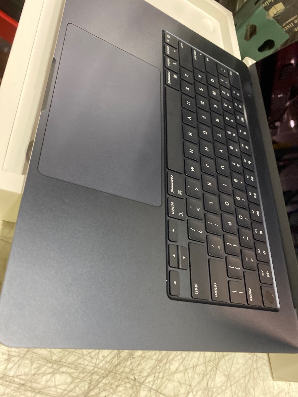 Photo 1 of Apple 2025 MacBook Air 15-inch Laptop with M4 chip: Built for Apple Intelligence, 15.3-inch Liquid Retina Display, 16GB Unified Memory, 256GB SSD Storage, 12MP Center Stage Camera, Touch ID; Midnight