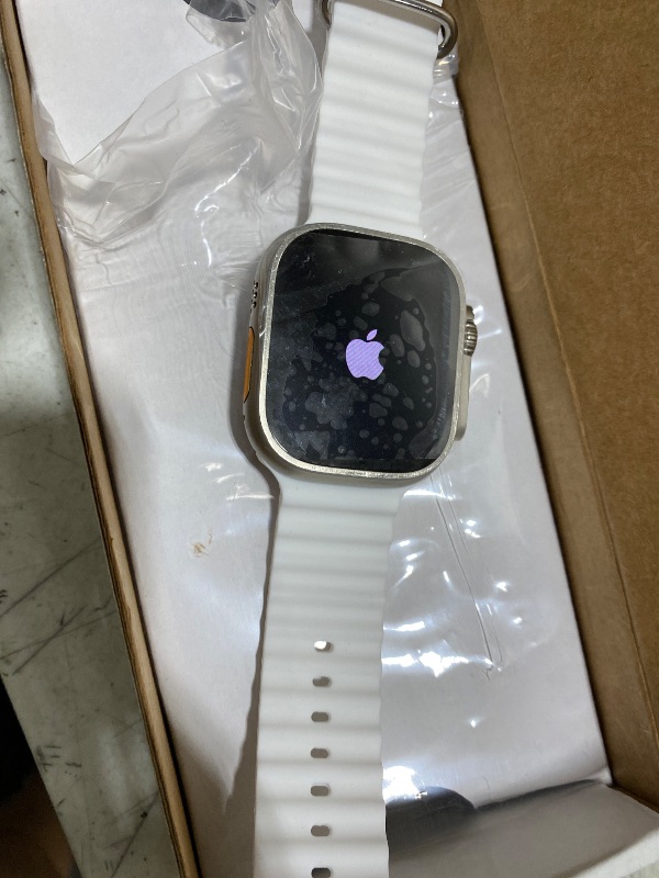 Photo 1 of Apple Watch Ultra 2 [GPS + Cellular 49mm] Smartwatch with Rugged Titanium Case & White Ocean Band. Fitness Tracker, Precision GPS, Action Button, Extra-Long Battery Life, Bright Retina Display