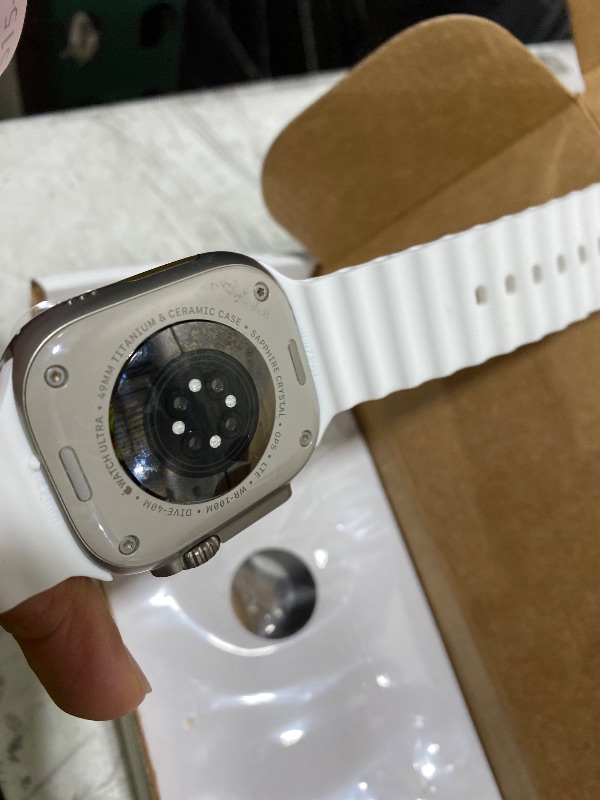 Photo 1 of Apple Watch Ultra 2 [GPS + Cellular 49mm] Smartwatch with Rugged Titanium Case & White Ocean Band. Fitness Tracker, Precision GPS, Action Button, Extra-Long Battery Life, Bright Retina Display