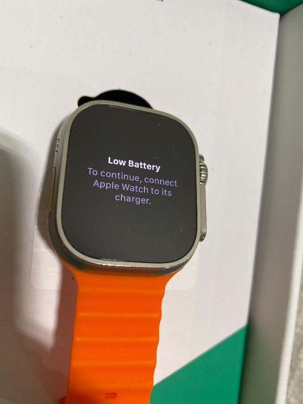 Photo 1 of Apple Watch Ultra 2 [GPS + Cellular, 49mm] - Rugged Titanium Case with Orange Ocean Band, One Size (Renewed Premium)