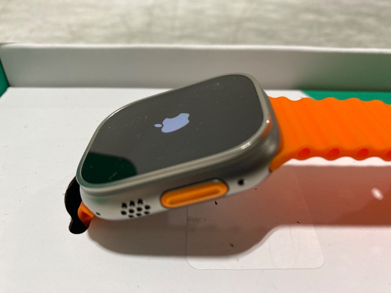 Photo 1 of Apple Watch Ultra 2 [GPS + Cellular, 49mm] - Rugged Titanium Case with Orange Ocean Band, One Size (Renewed Premium)