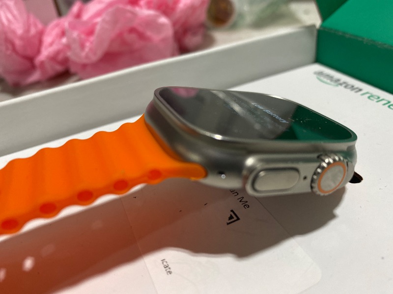 Photo 1 of Apple Watch Ultra 2 [GPS + Cellular, 49mm] - Rugged Titanium Case with Orange Ocean Band, One Size (Renewed Premium)