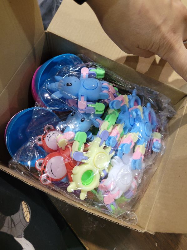 Photo 1 of 12 Pack 3.8'' Jumbo Filled Easter Eggs with Toys Transformable Animal Bunny Unicorn Fidget Spinners ,Easter Basket Stuffers Filler Essential Gifts for Kids Toddler Teens Stress Relief Party Favor Hunt