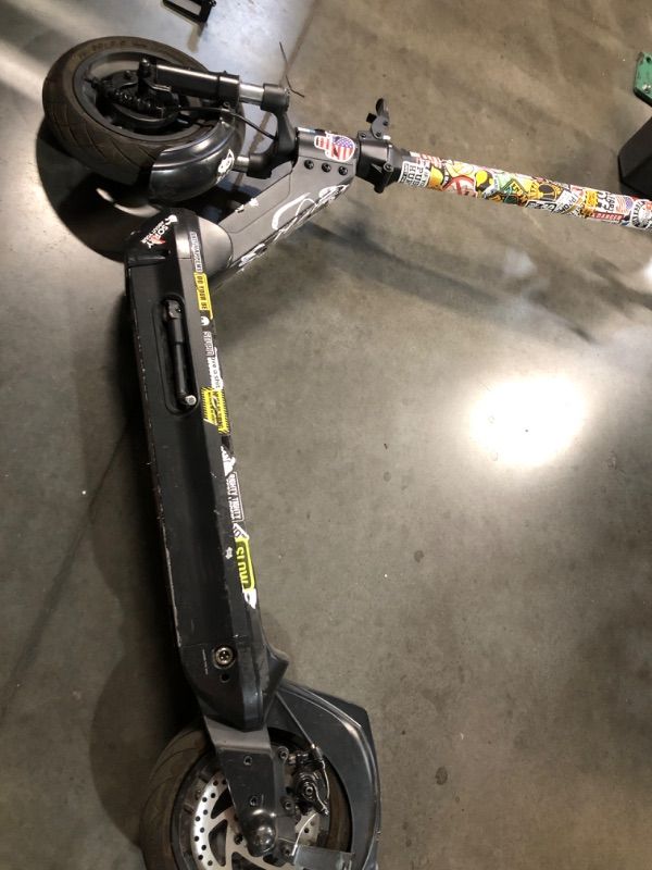 Photo 1 of **MISSING CHARGER** UNKNOWN IF FUNCTIONAL WITHOUT CHARGER** HANDLE LOOSE, NEEDS SCREWS** H-1 Pro Series Boss R800 Foldable Electric Scooter with 800W Motor, 24 mph Max Speed, 10” Self-Sealing Tubeless Tires, and 28 Mile Range