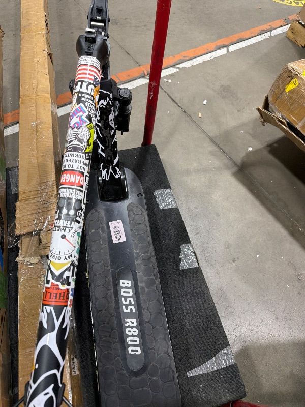 Photo 1 of **MISSING CHARGER** UNKNOWN IF FUNCTIONAL WITHOUT CHARGER** HANDLE LOOSE, NEEDS SCREWS** H-1 Pro Series Boss R800 Foldable Electric Scooter with 800W Motor, 24 mph Max Speed, 10” Self-Sealing Tubeless Tires, and 28 Mile Range