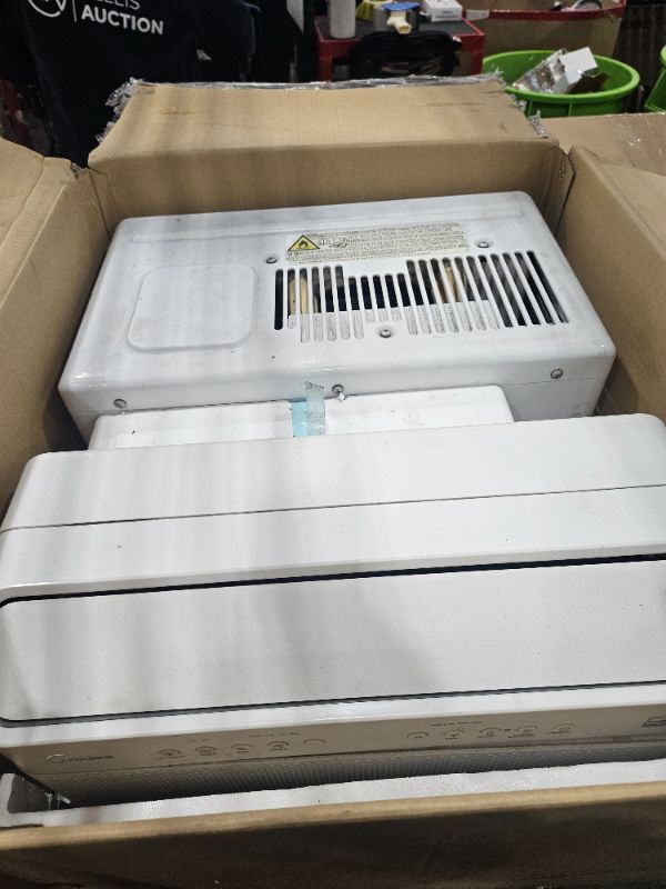 Photo 1 of *** For parts only not functional *** Midea 12,000 BTU U Shaped Smart Inverter Window Air Conditioner - Cools 550 Sq Ft, Ultra Quiet with Open Window Flexibility - Alexa/Google Assistant Compatible - 35% Energy Savings, Remote (Updated)