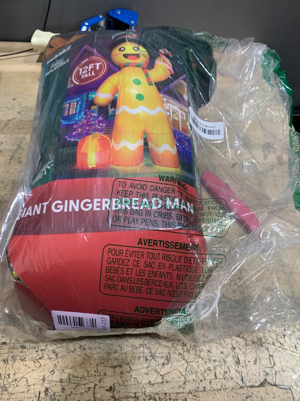 Photo 1 of 12FT Giant Christmas Inflatables Gingerbread Man Built-in Bright LED Light, Huge Christmas Decorations Outdoor Hold Candy Cane & Gift Large Christmas Blow Up Yard Decoration for Xmas Holiday Party