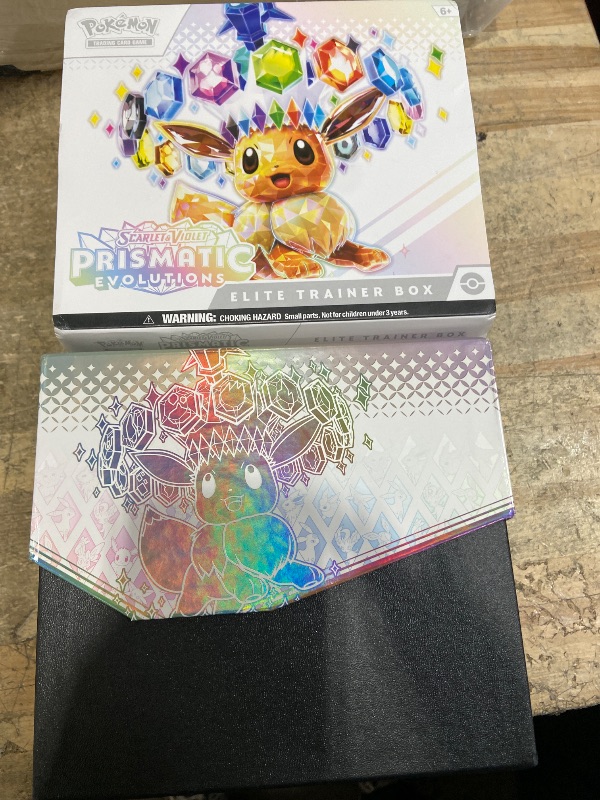 Photo 1 of *** CARDS HAVE BEEN PREVIOUSLY OPENEE. UNKNOWN IF THEY ARE THE ORIGNAL CARDS ***Pokemon TCG: Scarlet & Violet—Prismatic Evolutions Elite Trainer Box