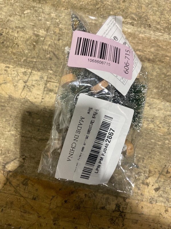 Photo 1 of 9-Pack Christmas Decorations Mini Artificial Christmas Trees - Bottle Brush Tabletop Holiday Decorations in 3 Sizes for Home and Party (Green)