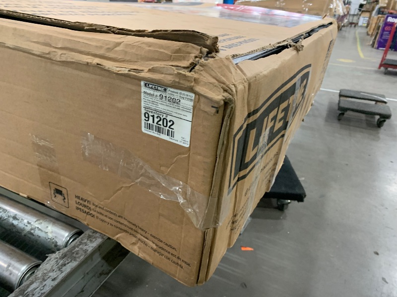 Photo 1 of (SOLD AS PARTS) Lifetime Adjustable Portable Basketball Hoop (54-Inch Tempered Glass)