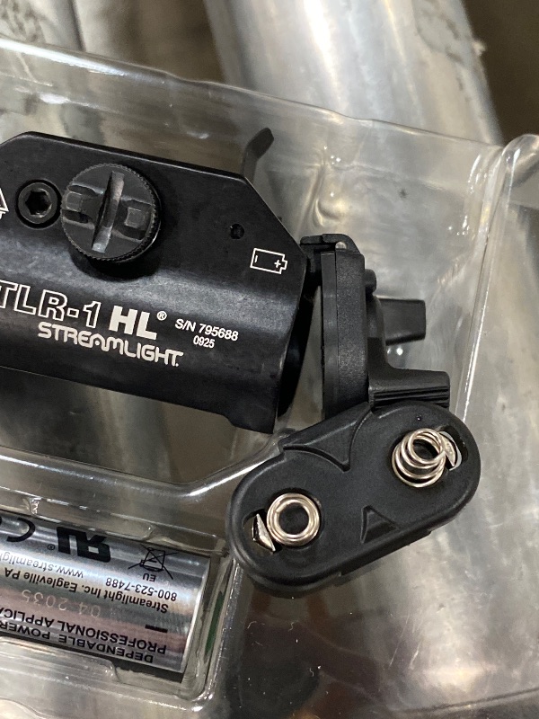 Photo 1 of ***BATTERY HOUSING WILL NOT LATCH ****Streamlight 69260 TLR-1 HL 1000-Lumen 20000 Candela Rail-Mounted Tactical Weapon Light with Specific Compatibility Rail Locating Keys, Black