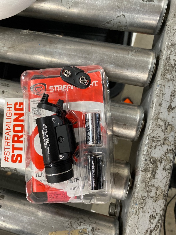 Photo 1 of ***BATTERY HOUSING WILL NOT LATCH ****Streamlight 69260 TLR-1 HL 1000-Lumen 20000 Candela Rail-Mounted Tactical Weapon Light with Specific Compatibility Rail Locating Keys, Black