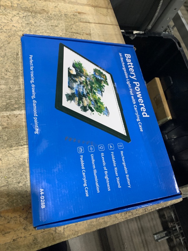 Photo 1 of ** won't hold charge**
Missing carry bag  YINGWOND Rechargeable A4 LED Light Pad with Padded Case, Tracing Light Box w/Riser Stands and Paper Clip, 6 Levels of Brightness, Type-c Cable, Wireless Diamond Painting Light Board