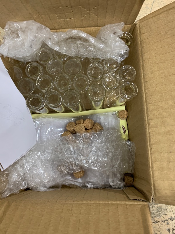 Photo 1 of Vynium 24 Set Wedding Match Holders Bulk,Match Striker Sticker Empty Glass Match Jars with Cork Top, Small Glass Bottles for DIY Organza Wedding Matches Favor Bridal Shower Party Supplies Guests Gift