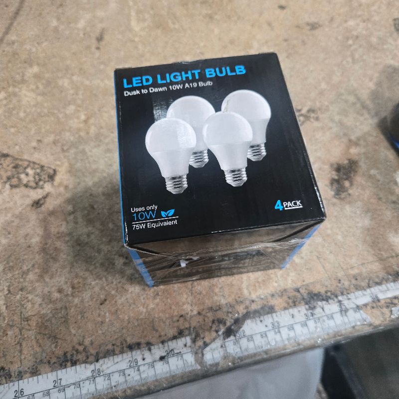 Photo 1 of ***3 NOT 4 BULBS**** 3 Pack Dusk to Dawn LED Light Bulbs 10W(75W Equivalent), 3000K Soft White 1100LM,E26 A19 Automatic Sensor Bulb, Built-in Photocell Detector for Garage Door, Porch, Outdoor Lighting(Non-Dimmable)