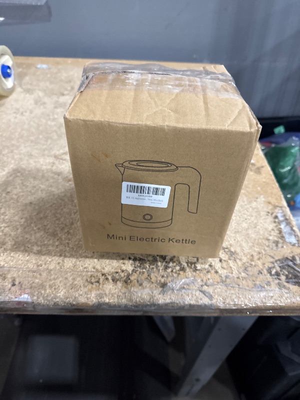 Photo 1 of 0.5L Small Portable Electric Tea Kettle Stainless Steel, Travel Mini Electric Coffee Kettle, Hot Water Boiler Heater for Business Trip, Camping, Travel, Office (Black)