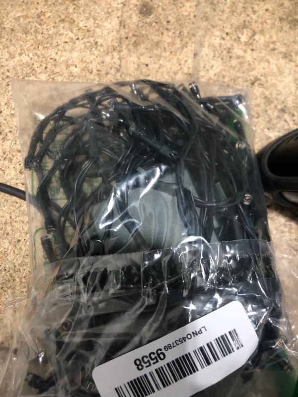 Photo 1 of ***UNKNOWN MISSING PIECES/ UNTESTED**** Battery Operated Christmas Lights, 33 FT 100 LED Mini String Lights with Timer and 8 Modes, Green Wire Outdoor Waterproof String Lights for Tree Xmas Indoor Holiday Party Garden Decor, Warm White