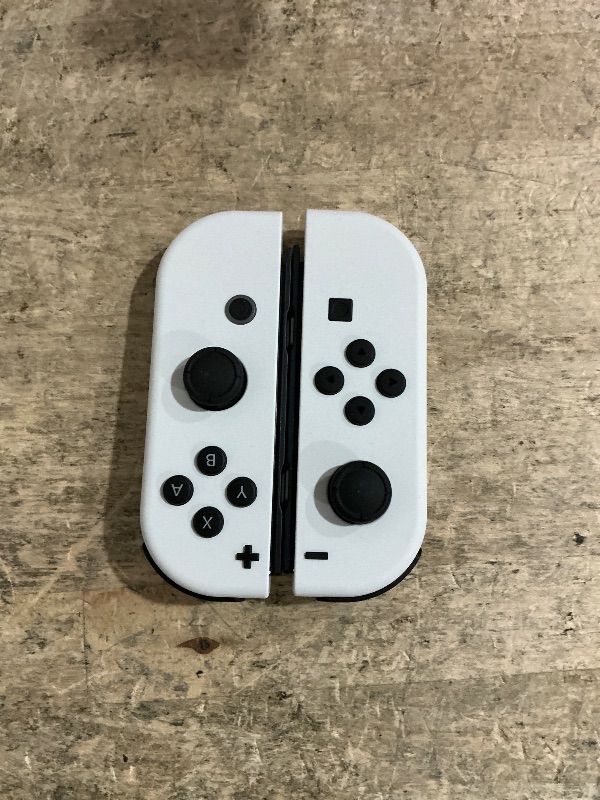 Photo 9 of Nintendo Switch – OLED Model w/White Joy-Con