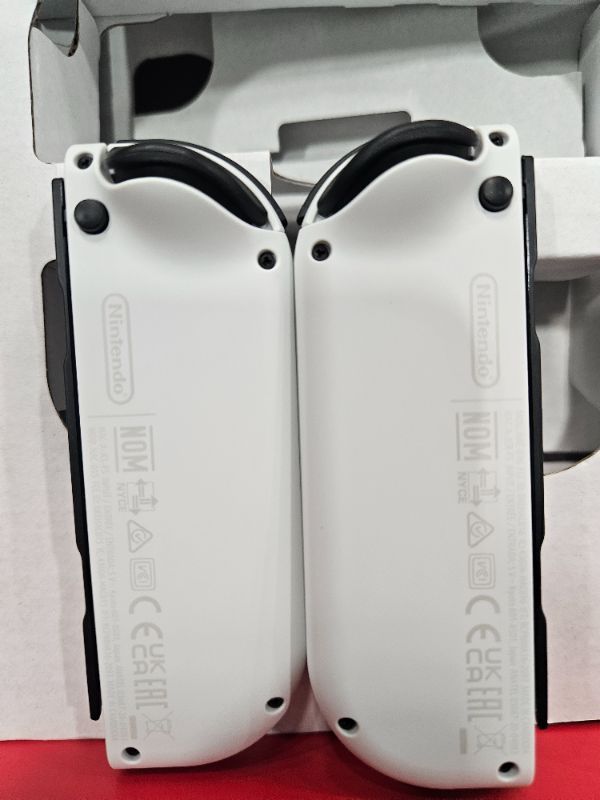 Photo 10 of Nintendo Switch – OLED Model w/White Joy-Con