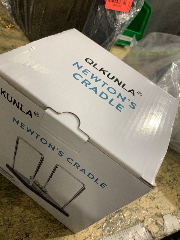 Photo 1 of QLKUNLA Newtons Cradle Balance Balls Science Physics Gadget Desktop Decoration Kinetic Motion Toy for Home and Office