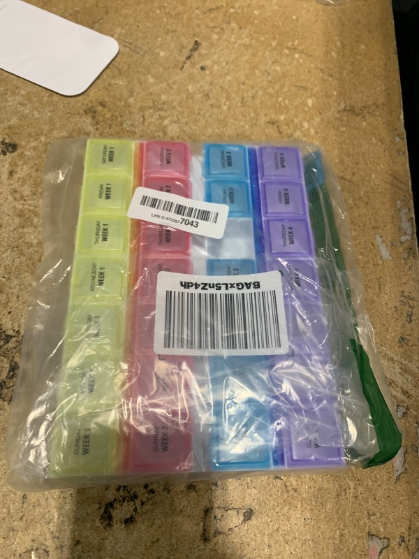 Photo 1 of ***BLUE ROW HAS 3 BROKEN CAPS***EZY DOSE Monthly (28-Day) Pill Case, Daily Medicine Planner, Vitamin Organizer, Supplement Container, One Month, Large Contoured Compartments, Convenient and Easy to Use, Colored Lids, BPA Free