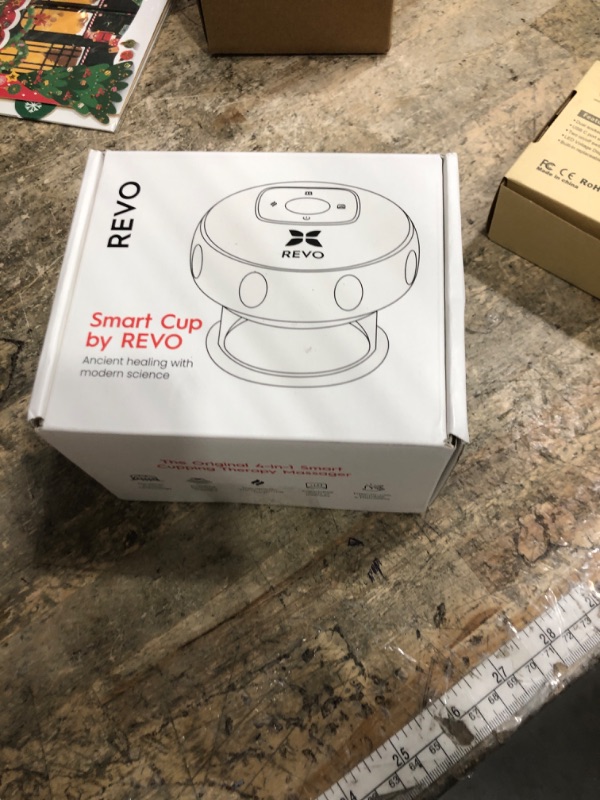 Photo 1 of REVOMADIC REVO The Original 4-in-1 Smart Cupping Therapy Massager, Red Light Therapy for Targeted Pain Relief, Knots, Aches, Muscle Soreness, Circulation & Tighter Skin, Portable Cupping Kit