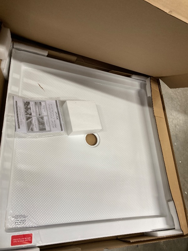 Photo 1 of **with a little damaged in one the courner **DreamLine SlimLine 42 in. D x 42 in. W x 2 3/4 in. H Center Drain Single Threshold Shower Base in White, DLT-1142420