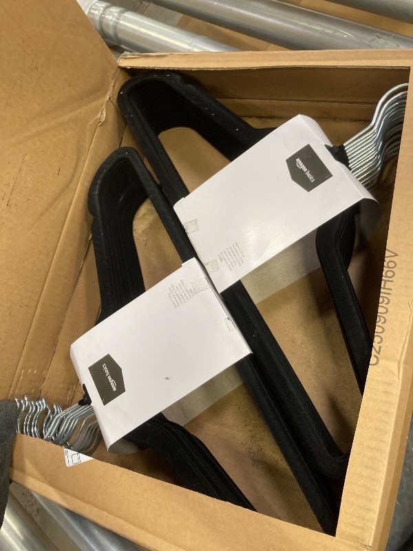 Photo 1 of ***MISSING 8****Amazon Basics Slim Velvet, Non-Slip Suit Clothes Hangers, Pack of 30, Black