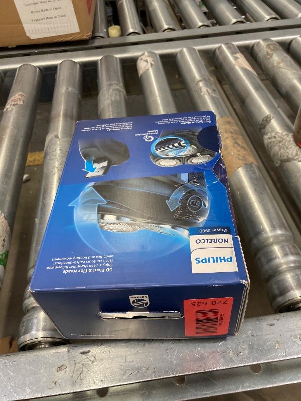 Photo 1 of **MISSING PARTS/NO POWER PLUG***Philips Norelco Shaver 3900 Series, Wet and Dry Electric Shaver, P-Cap, Travel Pouch, Charging Stand, Storm Blue, Model S3341/92