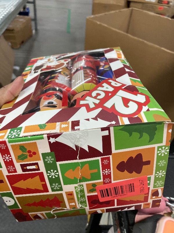 Photo 1 of 12 Pack Christmas No-Snap Party Table Favors, Christmas Party Supplies with Party Hat Joke & Little Surprise Toys Inside for Kids & Adults, Xmas Table Decorations Seasonal Holiday Dinner Table Gifts