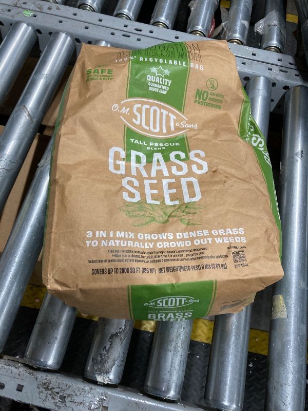 Photo 1 of ***SOME USED***O.M. Scott and Sons Tall Fescue Blend Grass Seed, Fertilizer and Soil Improver, Naturally Crowds Out Weeds, Covers Up to 2,000 sq. ft., 8 lbs.