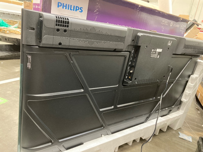Photo 1 of ***BROKEN***Philips 60" QLED 4K UHD Roku Smart TV with 3 Year Coverage