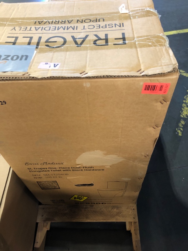 Photo 1 of ***FACTORY SEALED*** Swiss Madison St. Tropez SM-1T254HB One-Piece Elongated Toilet Vortex Dual-Flush 1.1/1.6 gpf with Comfort Chair Seat ADA Height in Glossy White with Black Hardware