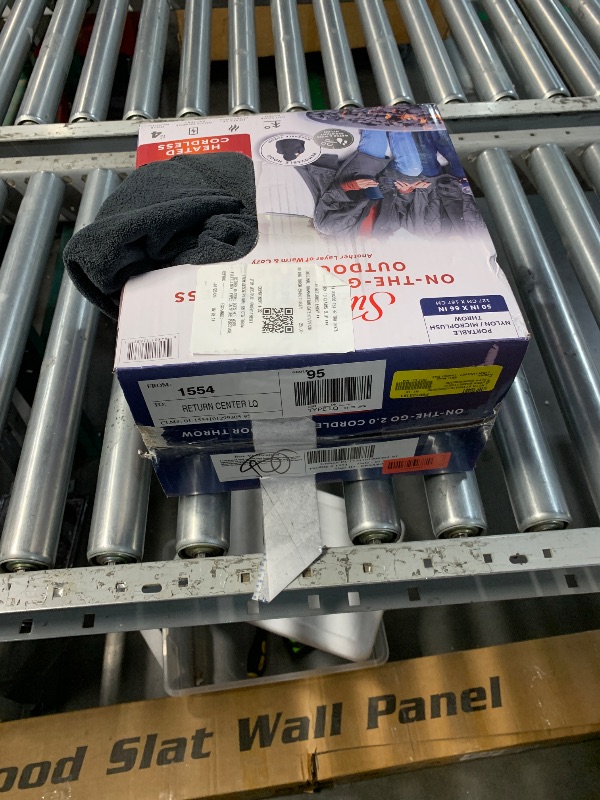 View 2 of
Sunbeam On-the-Go Cordless Heated Throw Blanket with Hood, Black Nylon/Microplush, 50x66
